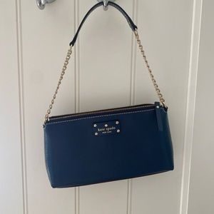 Navy blue Kate space shoulder bag.